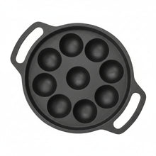 Load image into Gallery viewer, A dark gray cast iron pan with seven deep round domed cavities and two side handles, shown on a plain light gray background.